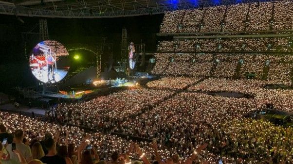 Coldplay live blue light tickets image