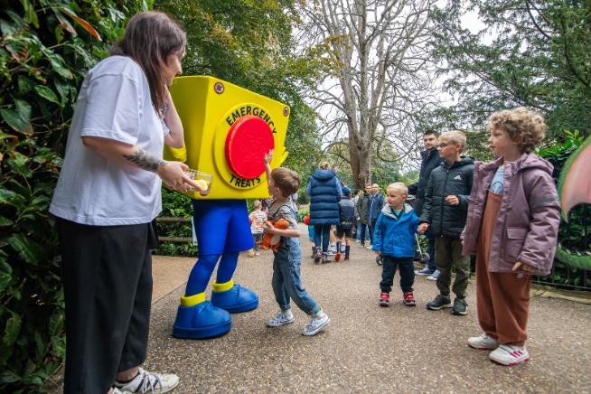 Blue Light Card's mascot handing out treats at Warwick Castle